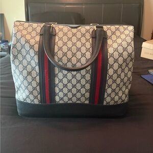 Gucci Men's Signature Pattern Duffel Bag with Red and Blue Stripes